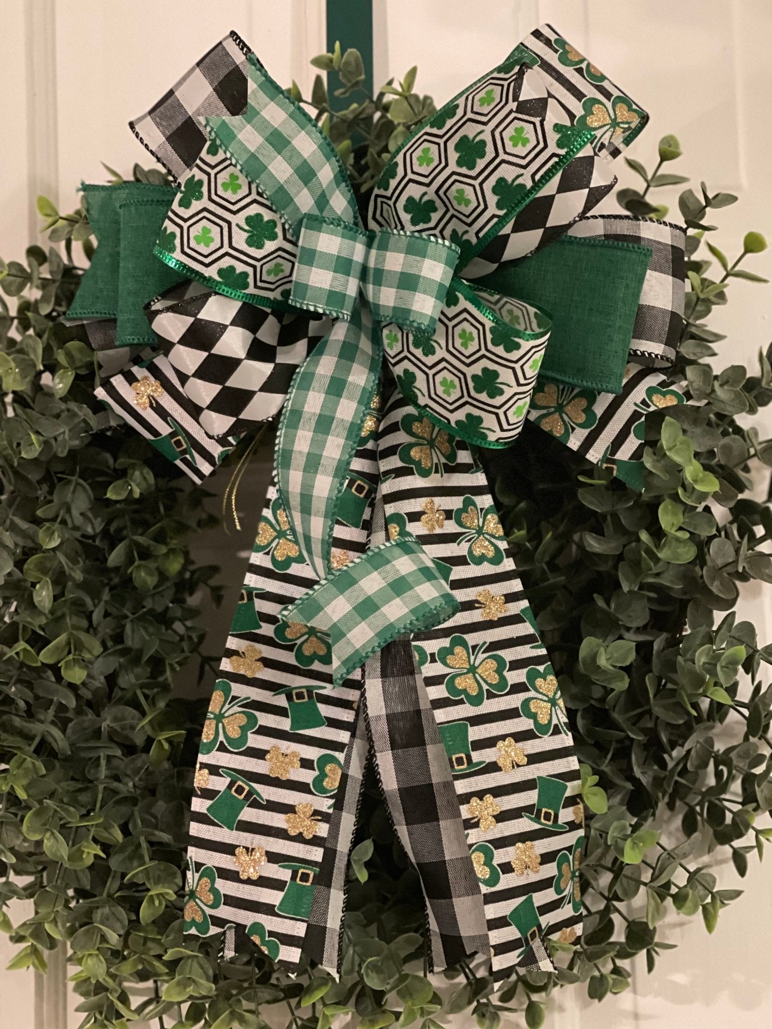 Shamrock ribbon with white clovers on a green and black buffalo plaid  background printed on 1.5 white grosgrain, 10 yards