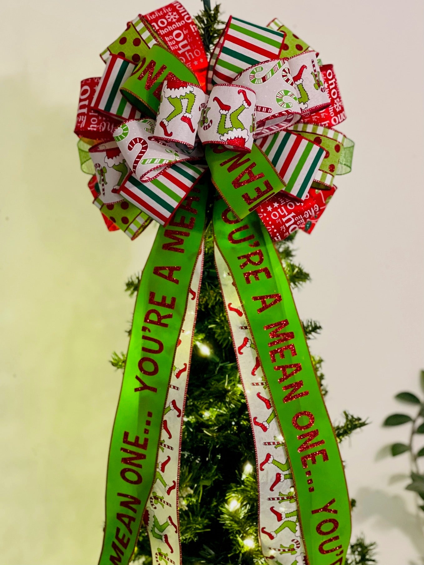 Large Green Monster Legs Christmas Tree Topper Bow