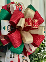 Red, Green & Gold Nutcrackers Christmas Bow - Emerald's Avenue