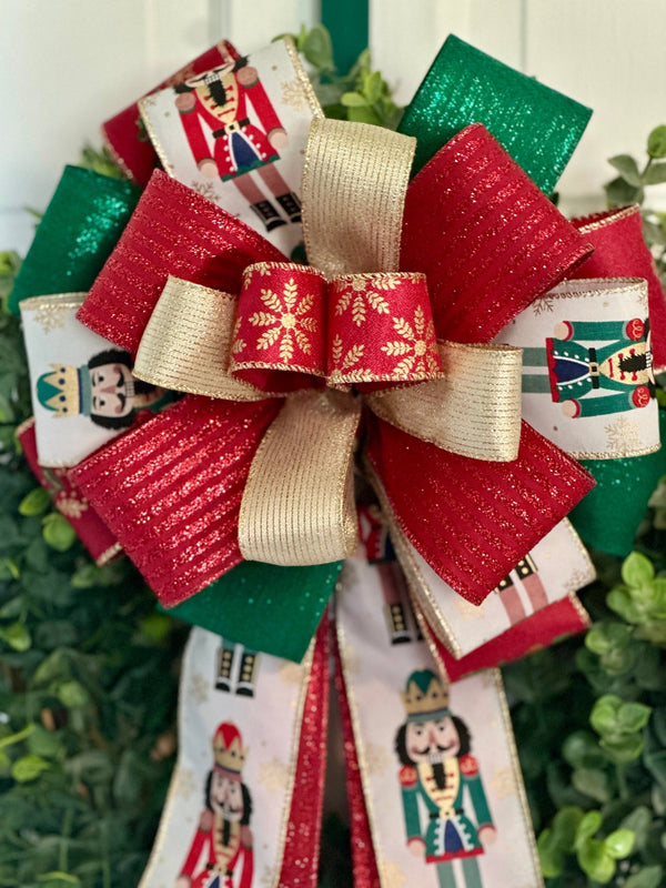 Red, Green & Gold Nutcrackers Christmas Bow - Emerald's Avenue